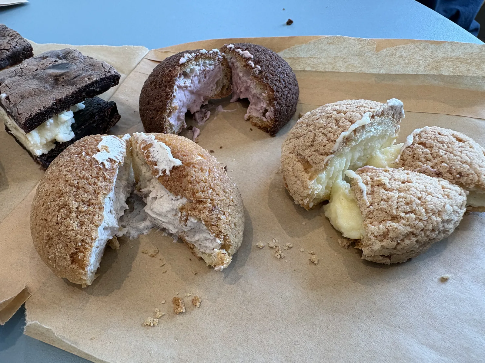 gluten free lovely ice cream puffs and brownie cookie showing the inside
