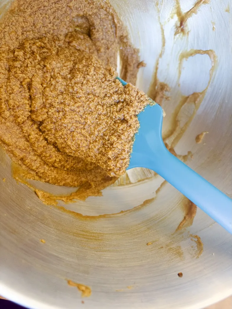 gluten-free gingerbread cookie dough being stirred