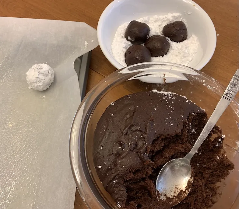shaping the Christmas Chocolate Crinkle cookies