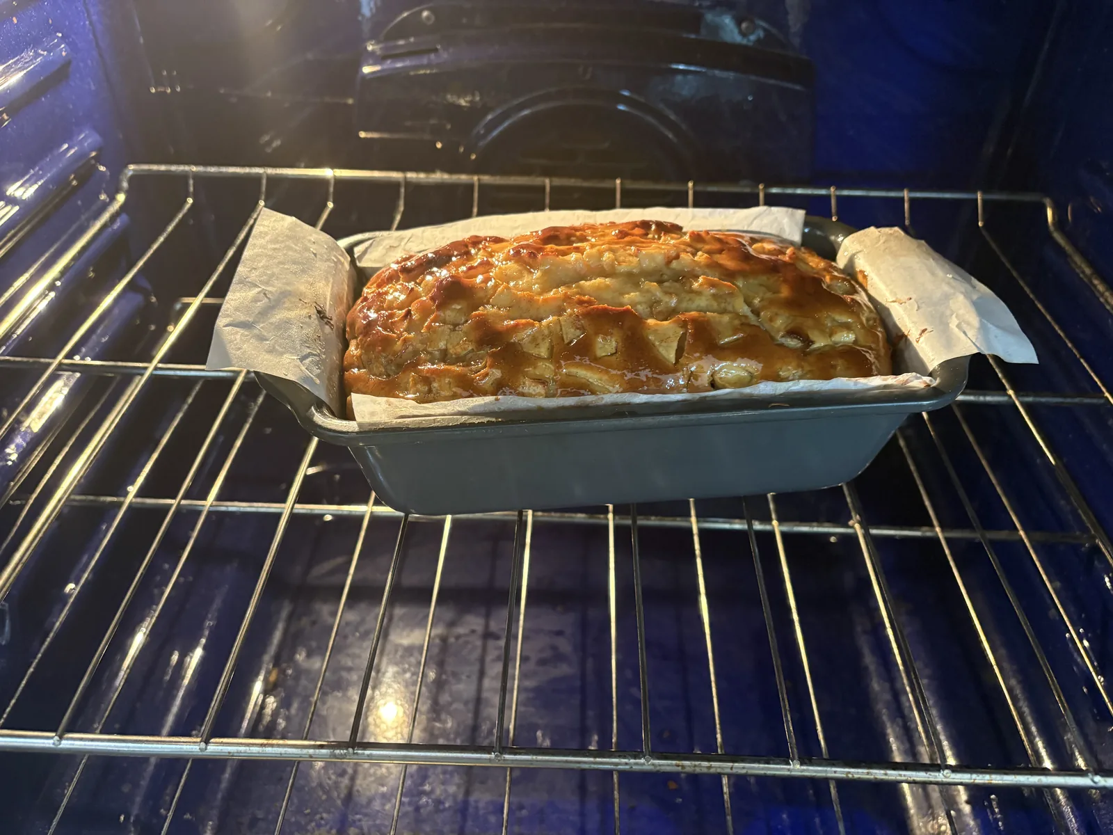 put brushed syrup loaf in oven